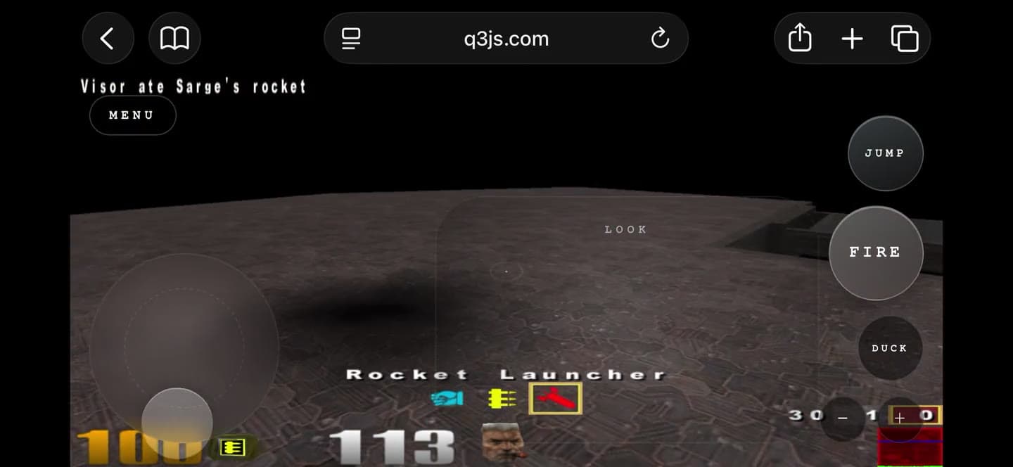 Mobile Quake III Arena match in Q3JS showing the movement joystick, aim area, and touch buttons